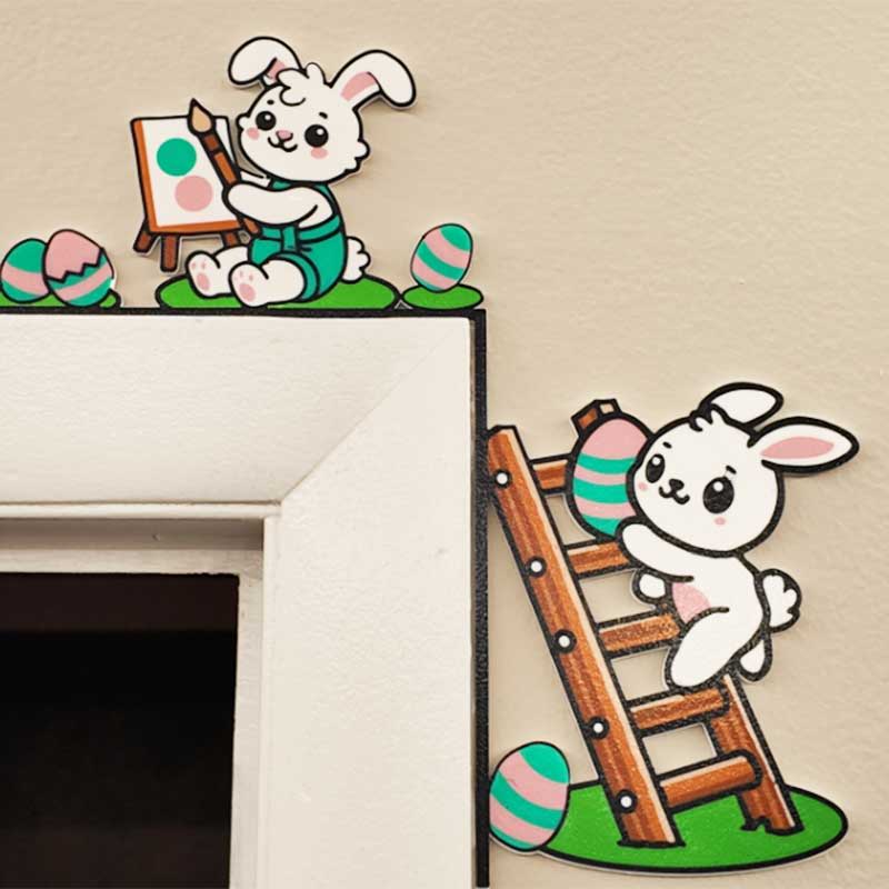Two cartoon bunnies decorating Easter eggs near a door.