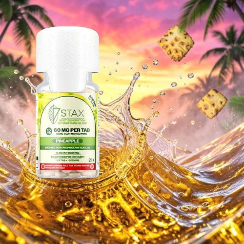A bottle of liquid with a splash against a colorful sunset background.