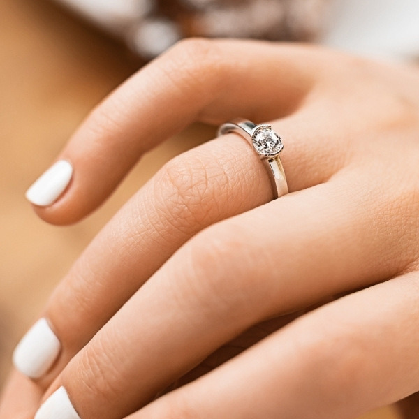 a beautiful and simplistic single stone engagement ring