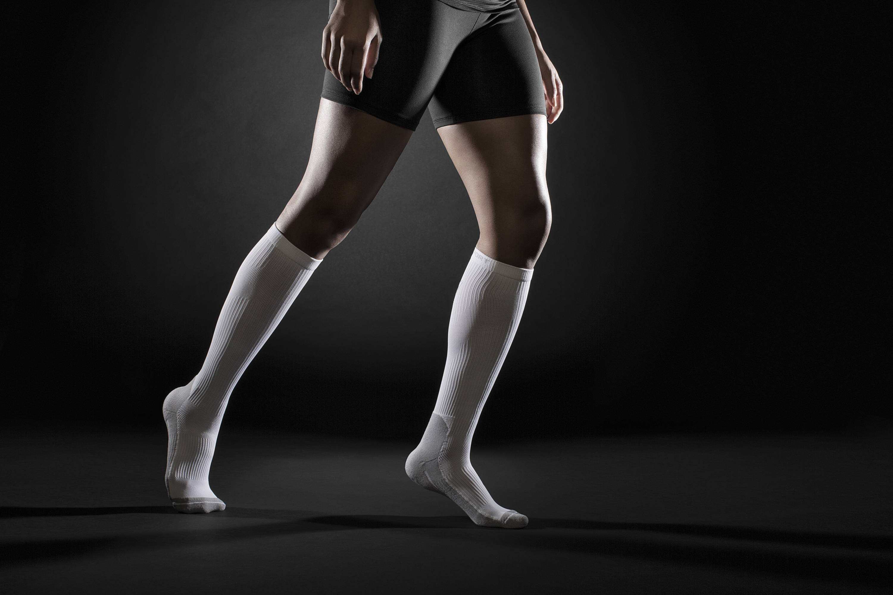 Woman wearing TheraSport compression socks