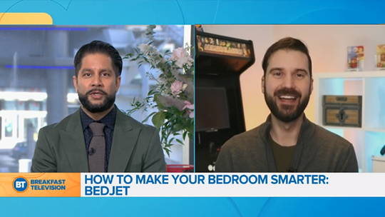 A still from the Breakfast Television Toronto show, showing two hosts discussing how BedJet makes your bedroom smarter
