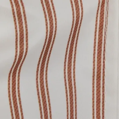 Fabric with wavy lines in brown and white stripes.