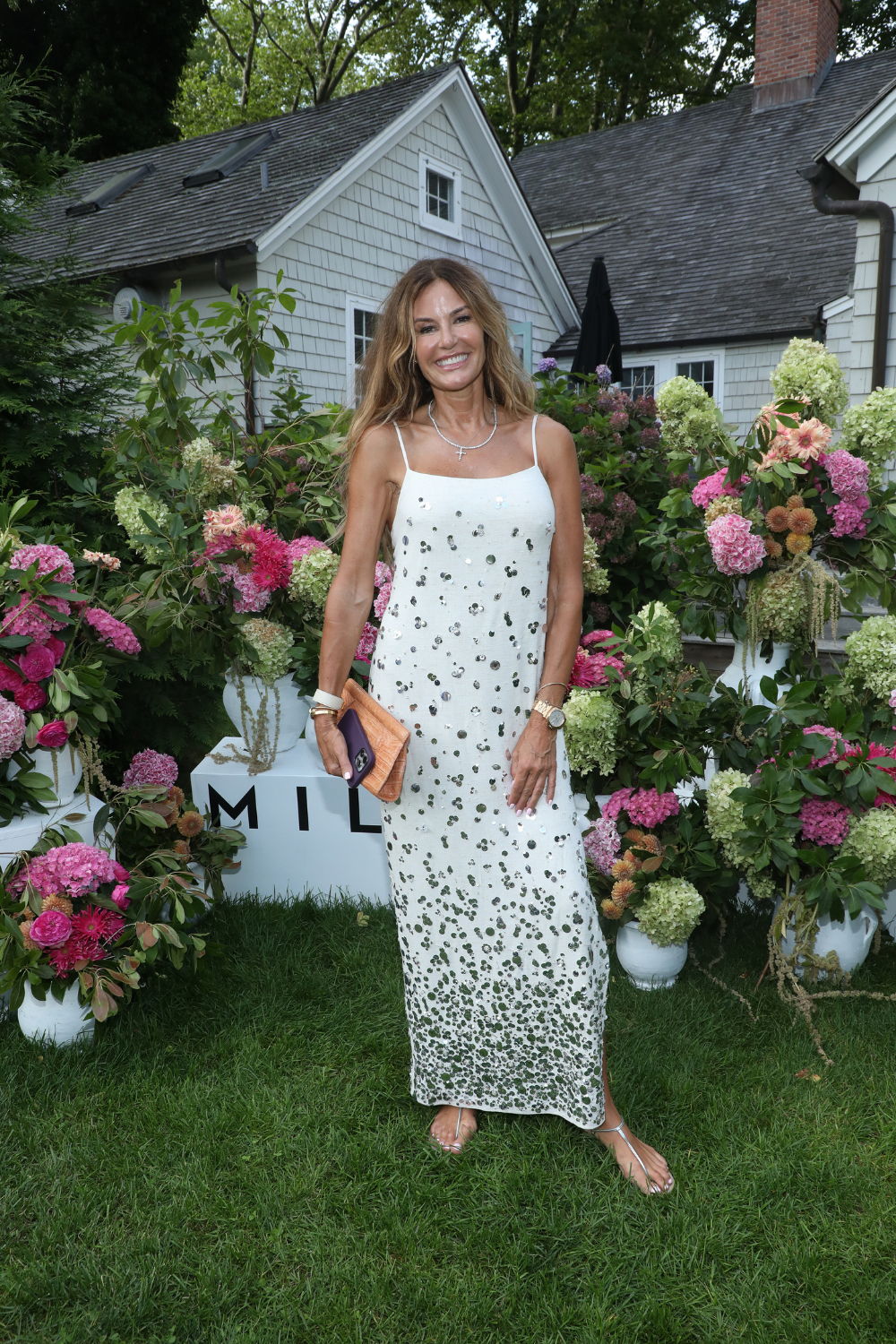 Wearing the Lily Sequin Dress at MILLY x The Daily Front Row's Maidstone Hamptons Cocktail Party.