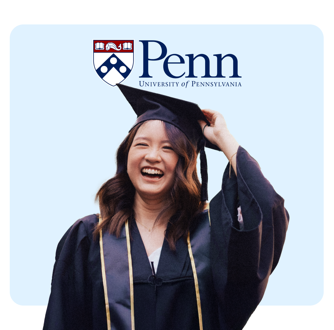 Graduation celebration at the University of Pennsylvania, joyful student in cap and gown.
