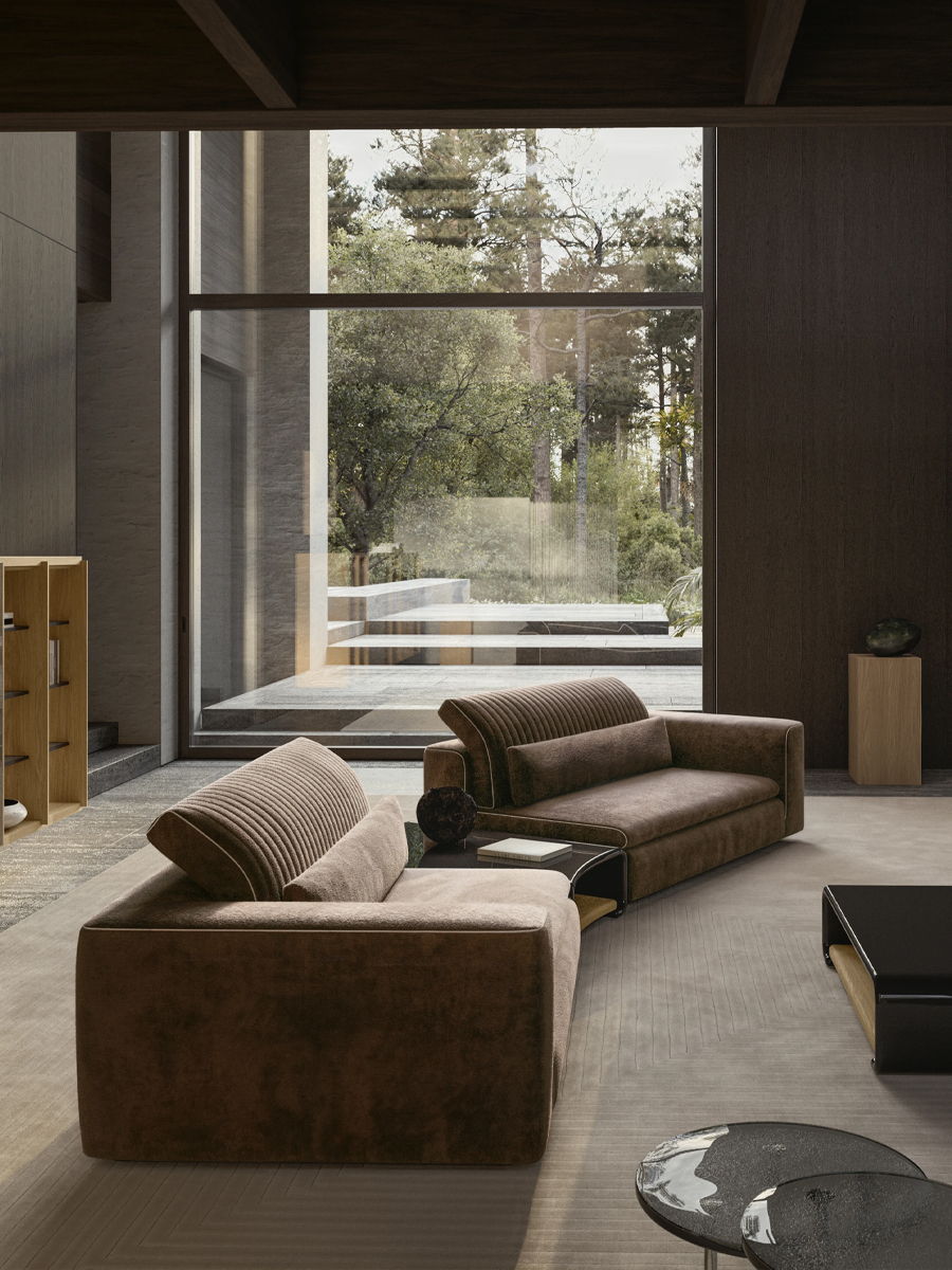 Modern living room with large windows, brown Molteni&C sofas, and minimalist decor.