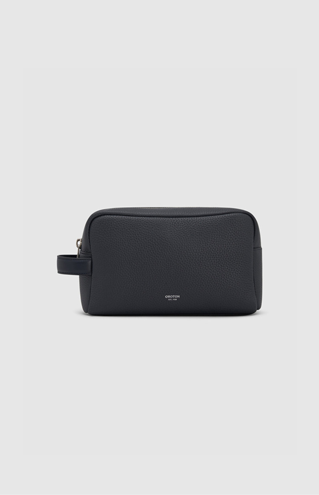 Black leather pouch with a handle, minimalist design.