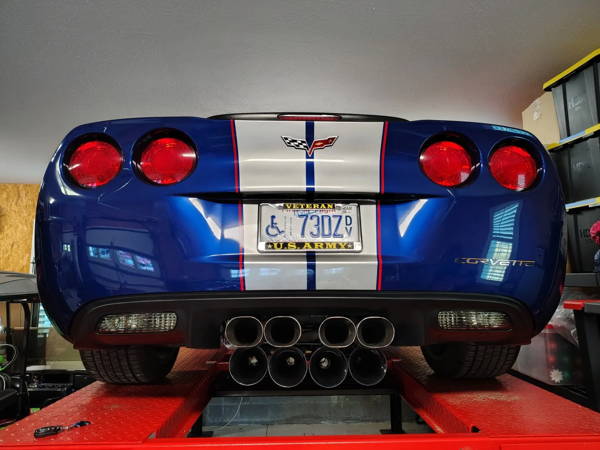 Shocker XL horns mounted under the front of a 2007 Corvette
