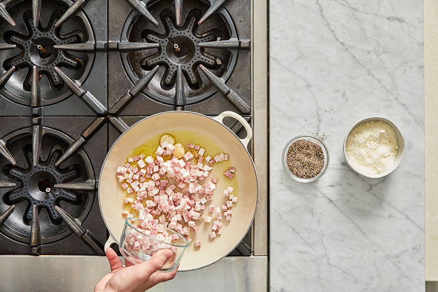 Garlic and Pancetta sautéing in olive oil.