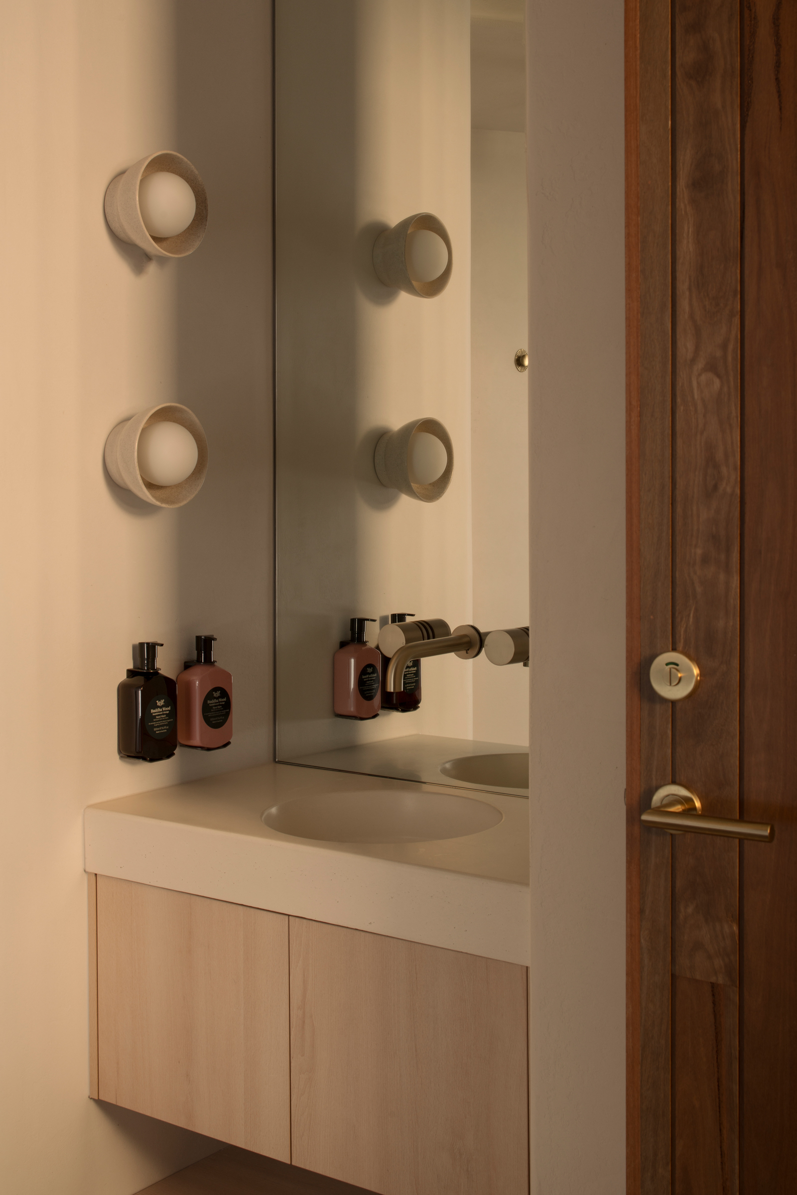 ceramic bathroom wall light with sun setting warm lighting