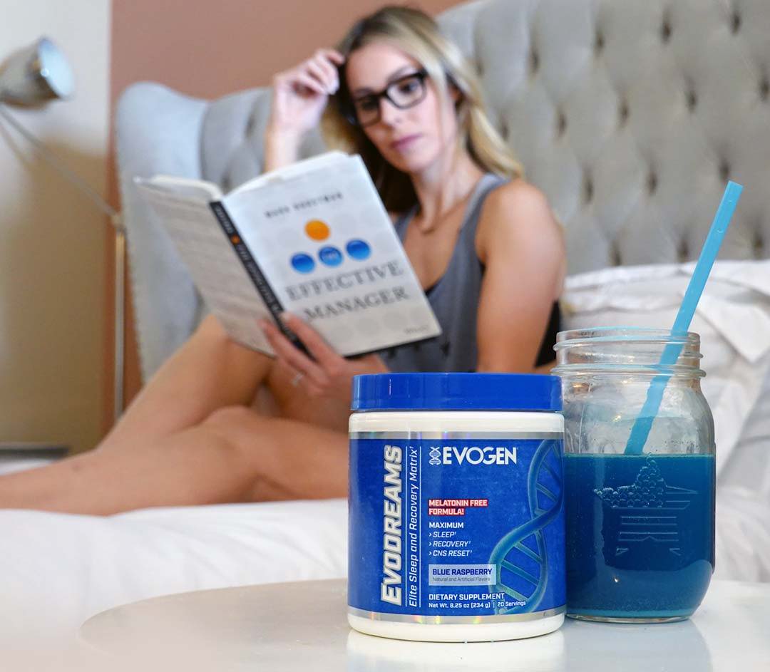 Athlete reading in bed behind a can of Evodreams