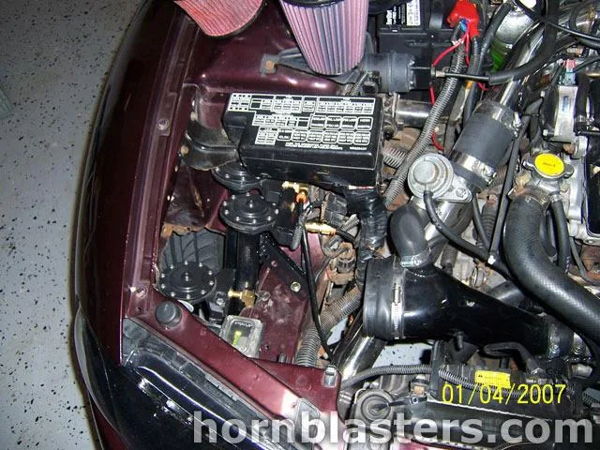 Engine bay air horn trumpets fuse box purple intake filters 1999 Mitsubishi Eclipse Shocker XL train horn kit gallery photo 6
