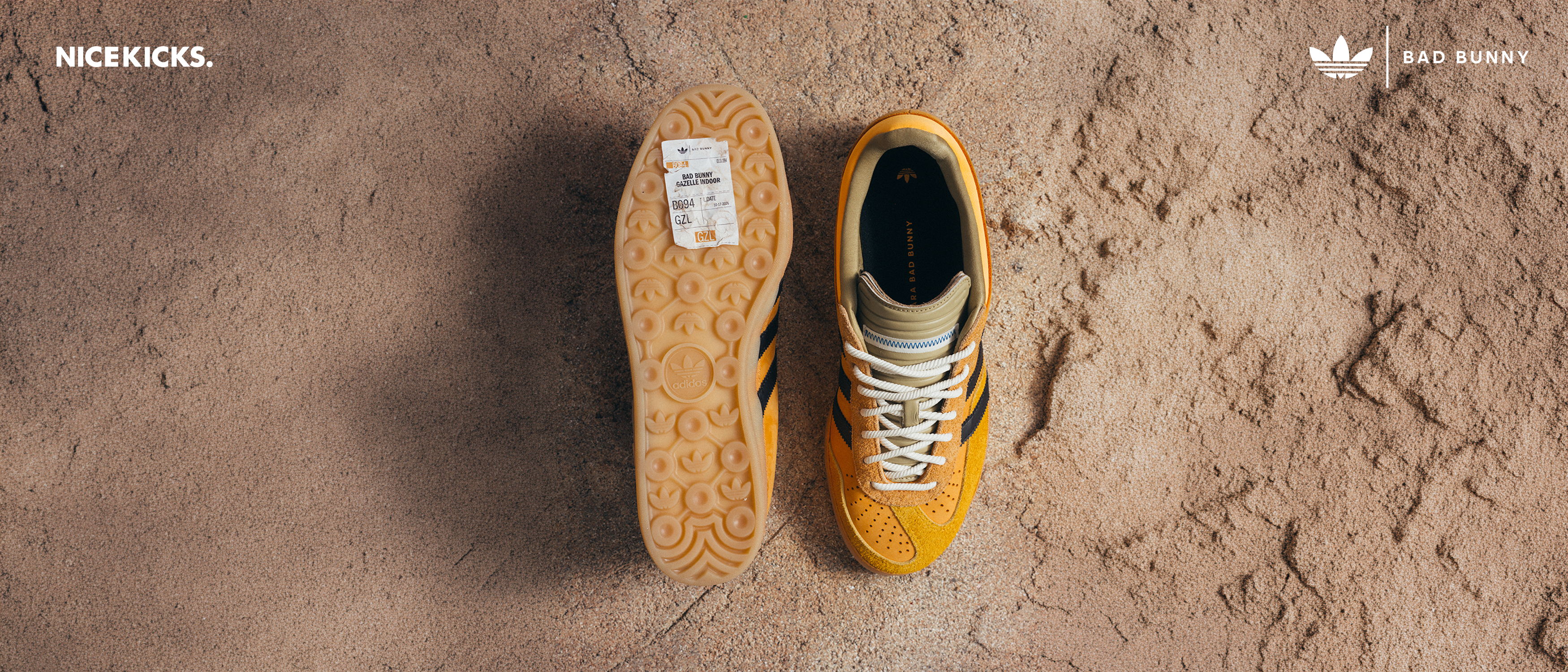 A pair of brown sneakers on a textured surface.