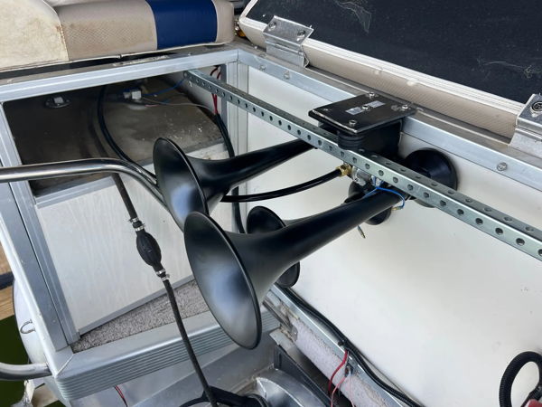 Outlaw 228H train horn bells mounted under seat in pontoon storage compartment photo 3