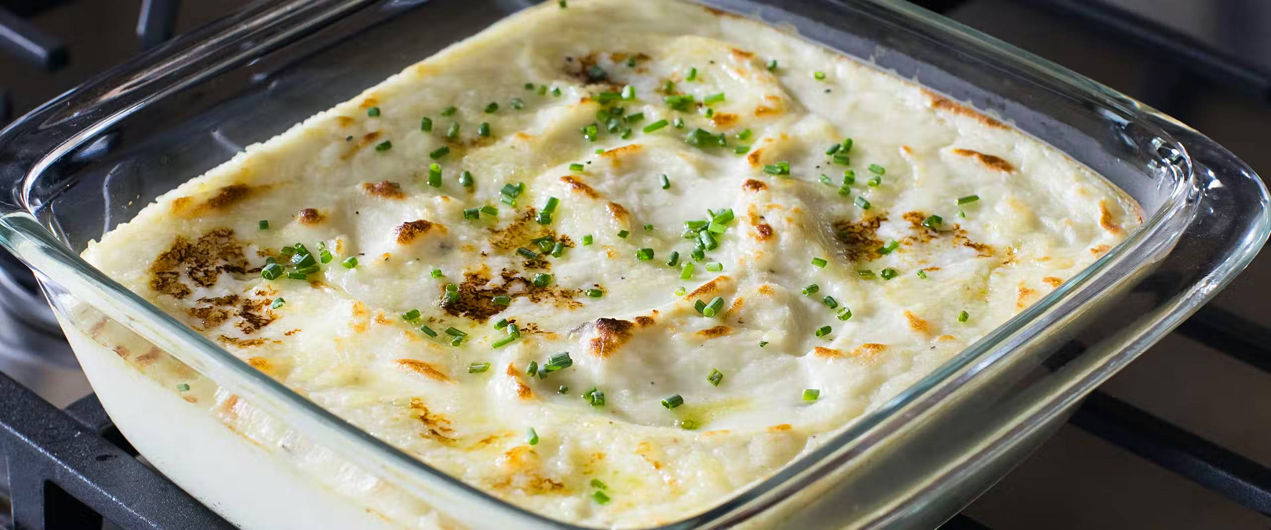 Make Ahead Mashed Potatoes in a glass baking dish