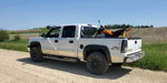 Joshua's white 2005 Chevrolet Silverado 1500 4x4 with dirt bike in bed thumbnail