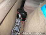 Air tank and compressor mounted behind rear seat inside Winston's Silverado cab photo 4