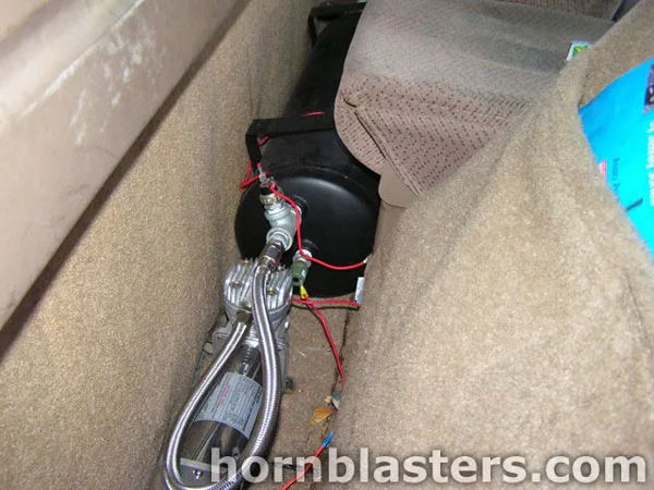 Air tank and compressor mounted behind rear seat inside Winston's Silverado cab photo 4