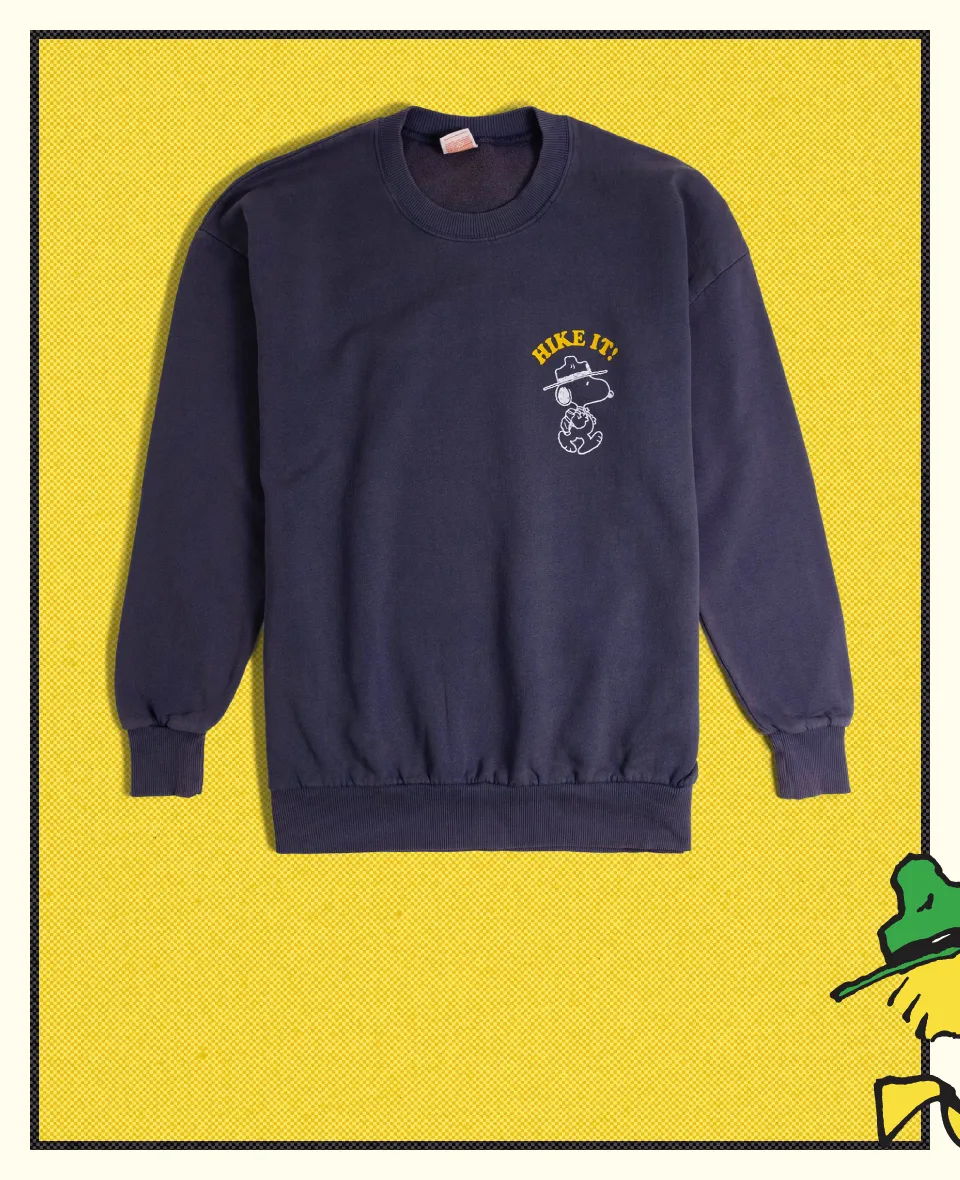 Navy sweatshirt with a graphic print on the front.