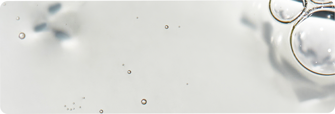 Bubbles on a light background, creating a soft and airy effect.