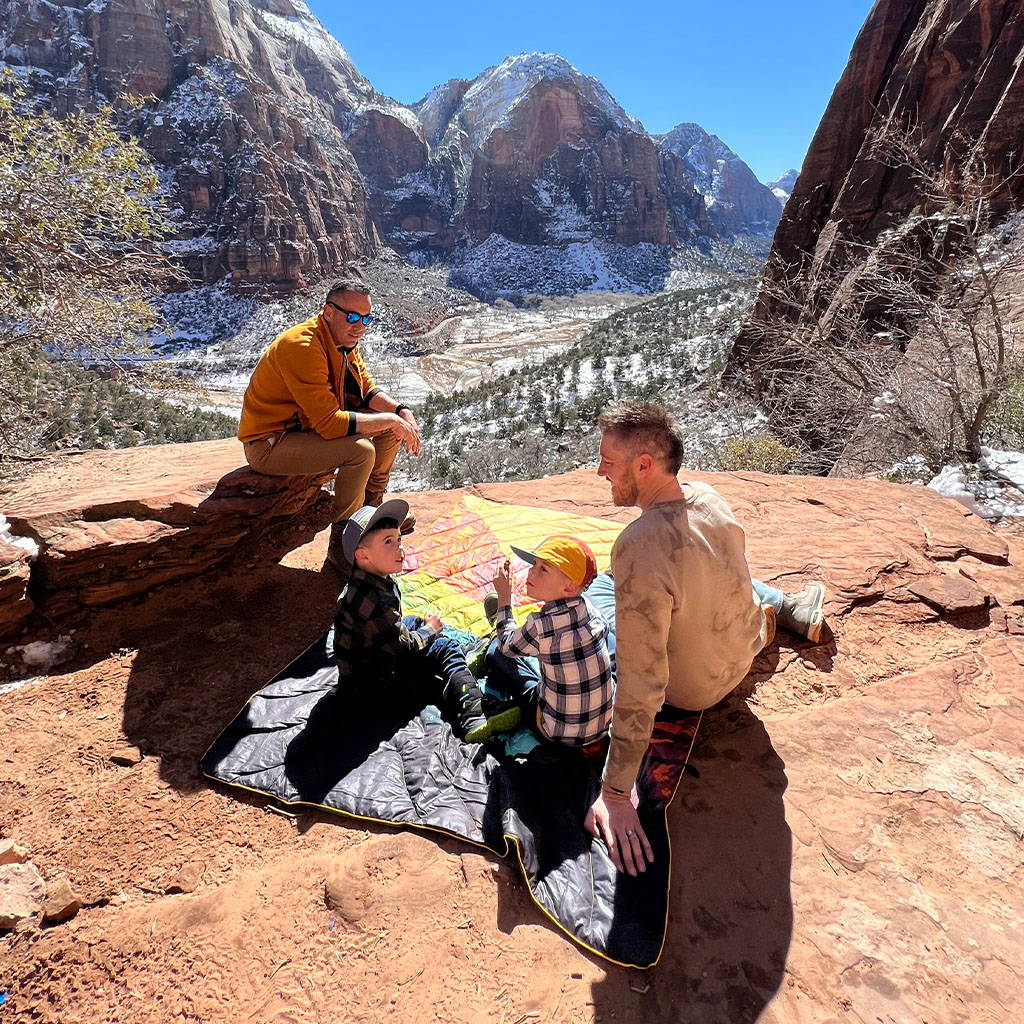 Fontes Four Pack sitting on Zion National Park Rumpl blanket