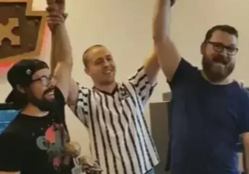 Photo of J!NX employees winning a video game tournament