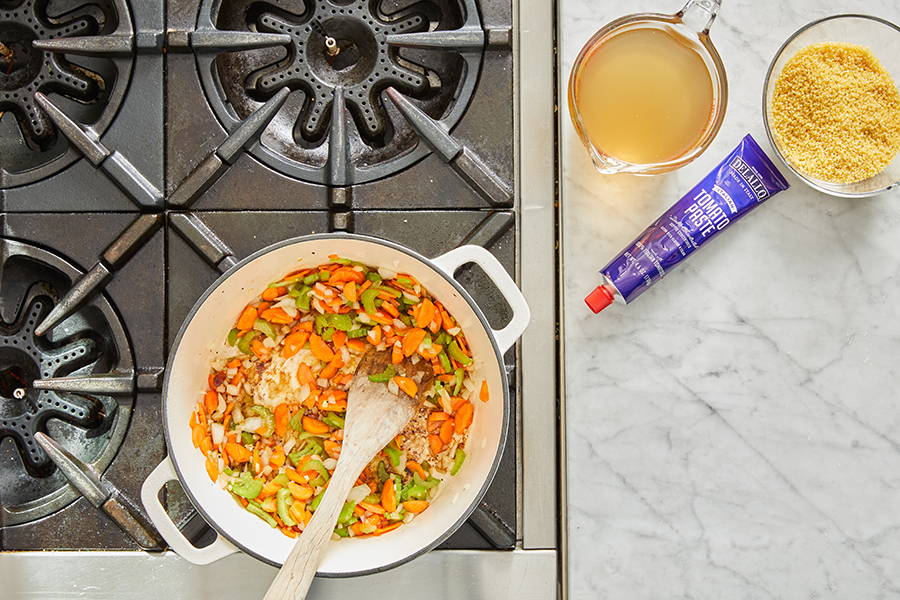 Stirring vegetables while they cook