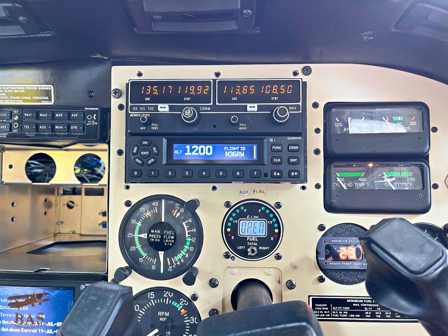 Aircraft cockpit panel with instruments and controls displayed.