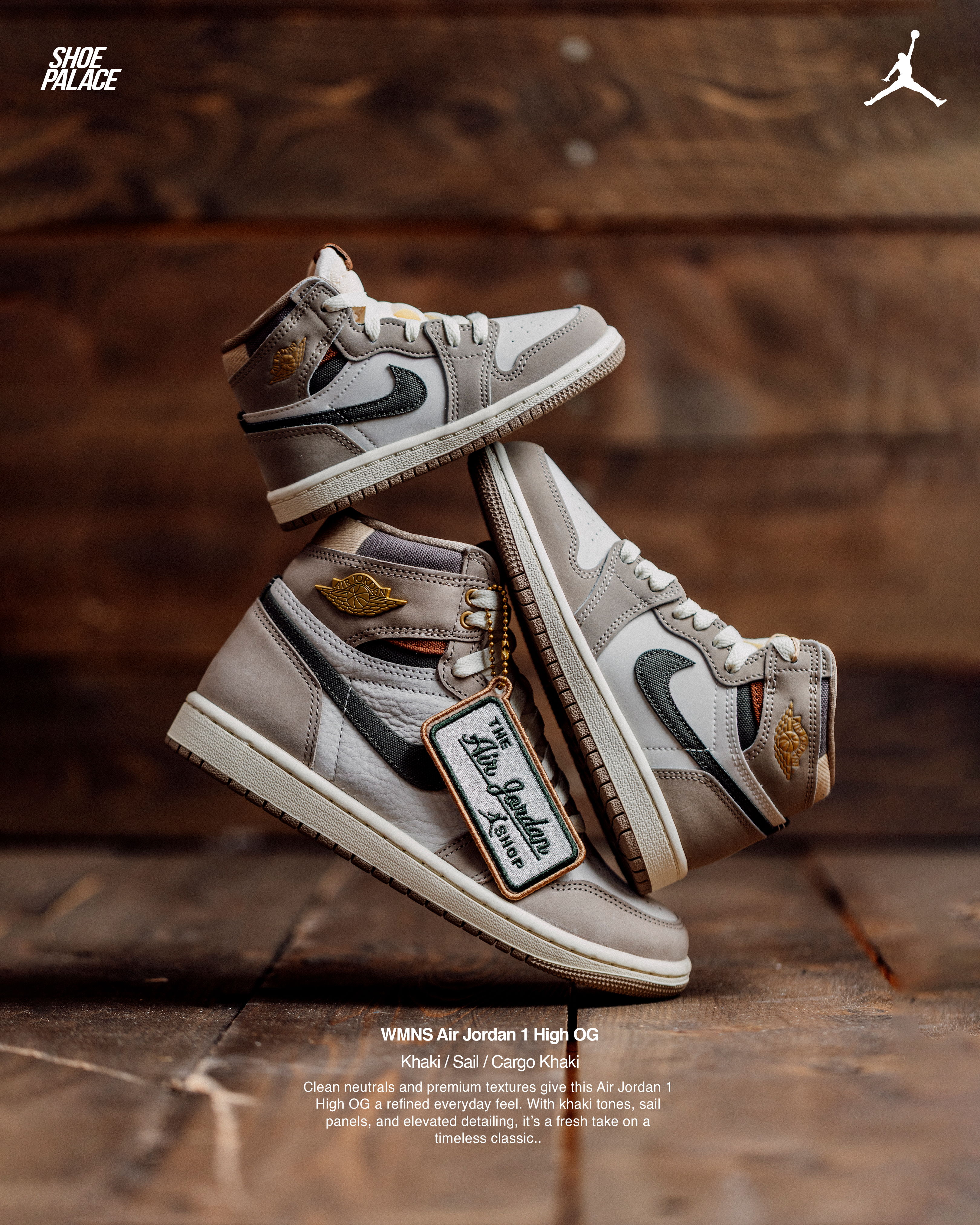 Two pairs of Air Jordan sneakers stacked on a wooden background.
