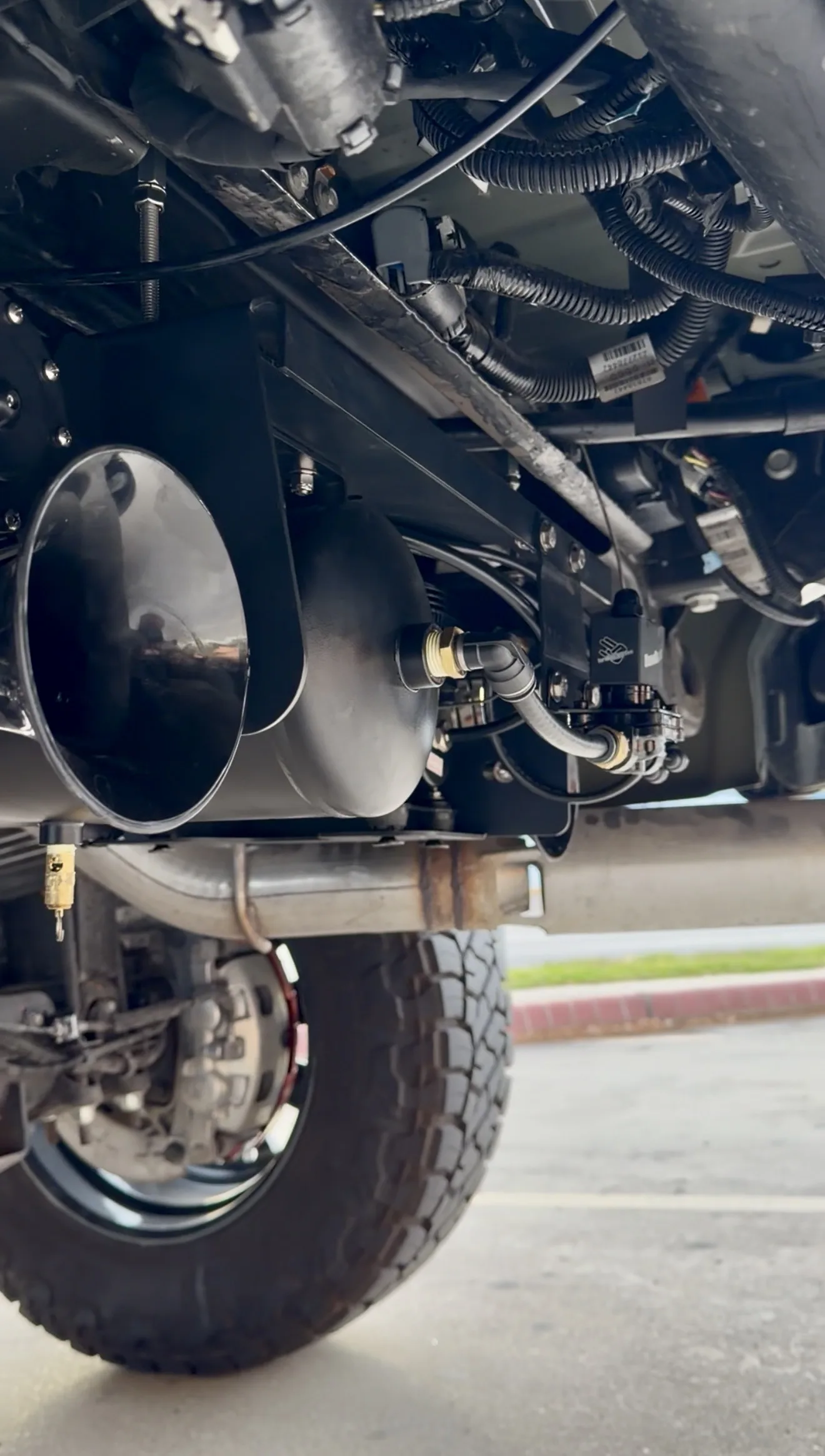 Mark's 2026 Chevrolet Silverado 2500 HD Z71 Stealth Spare Tire Delete Kit train horn install gallery photo 2