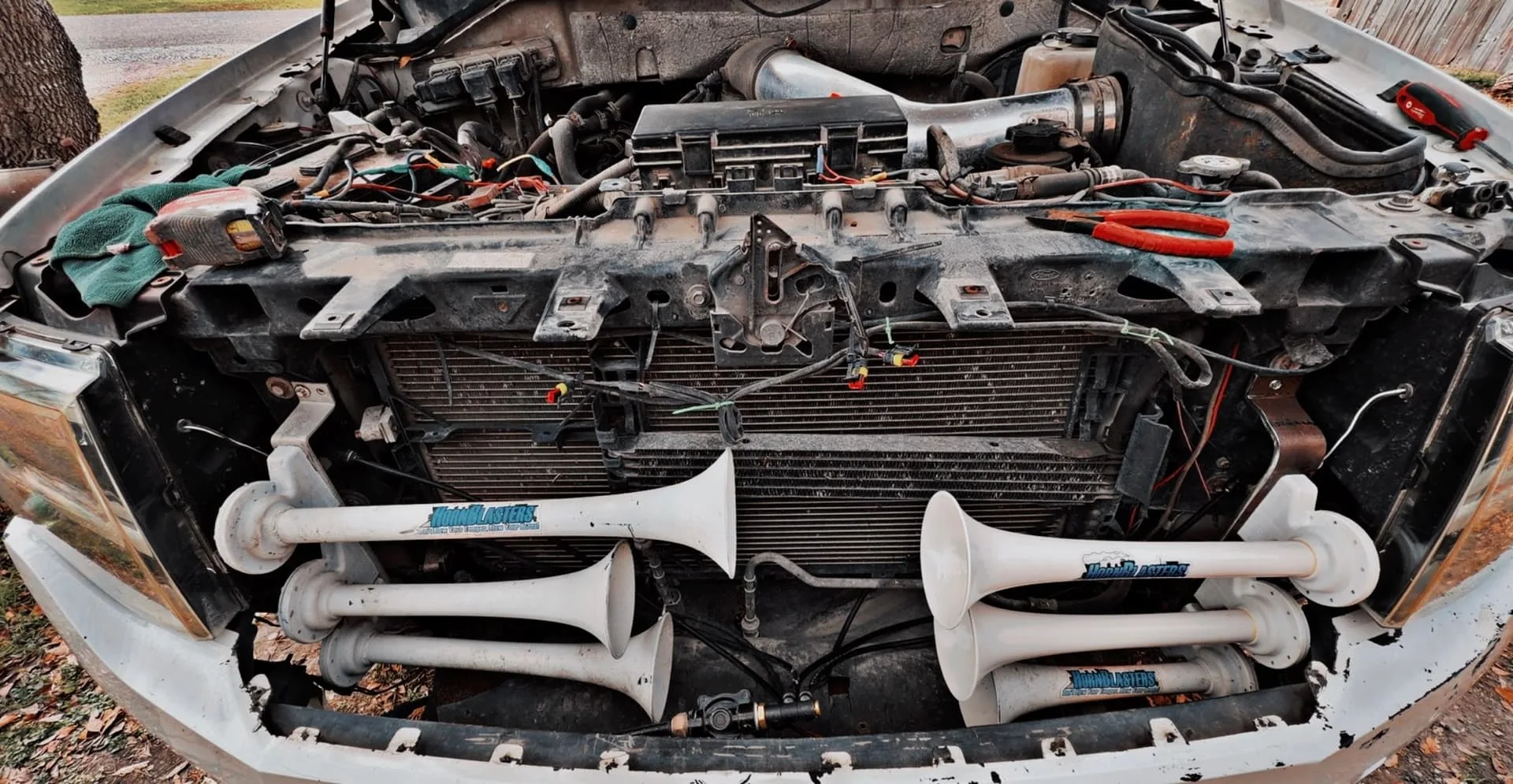 Arturo's 2010 Ford Expedition train horn installation detail with Shocker S6 544K kit photo 3