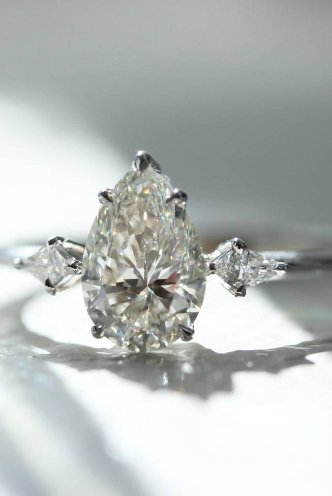 Pear Shaped Diamond Ring With Kite Diamond Side Stones