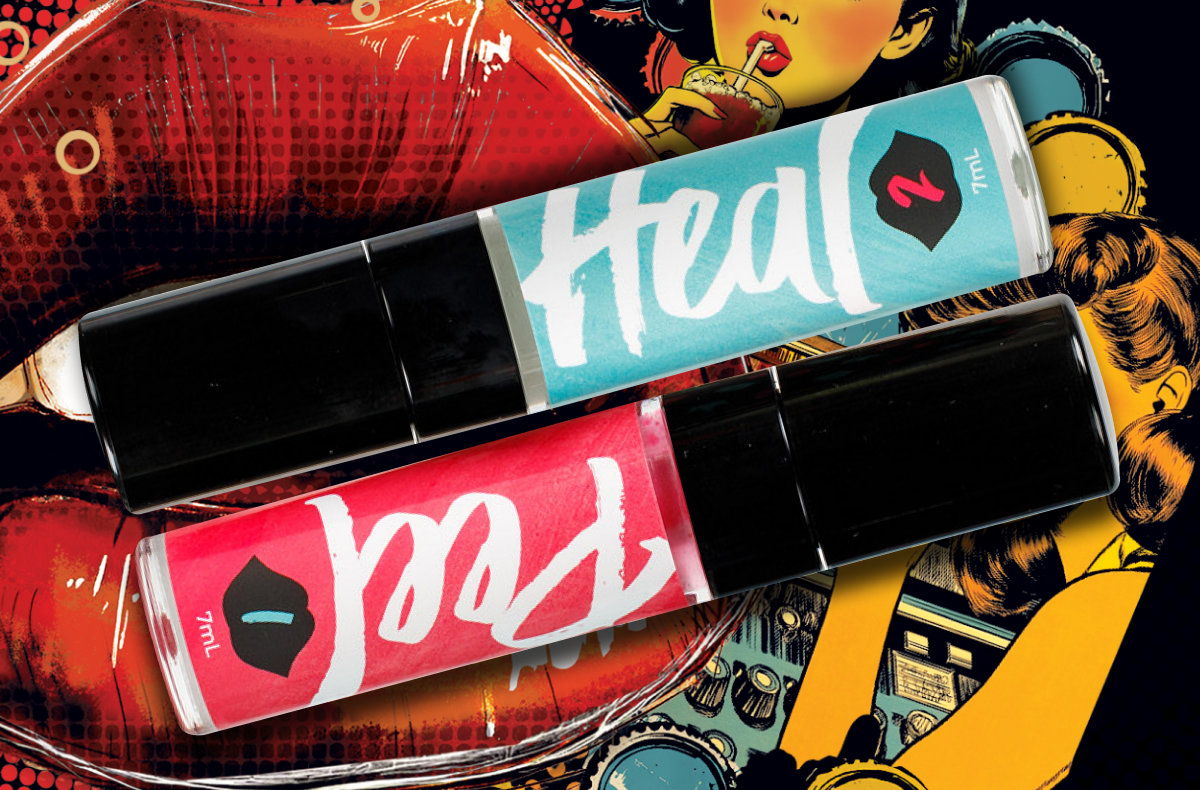 Person holding a decorative brown package on a marble surface.