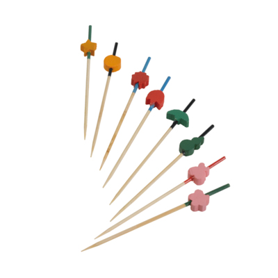 Several bamboo skewers with colorful designs