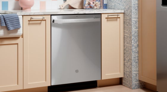 Dishwasher installed in a modern kitchen with light cabinetry and countertop.