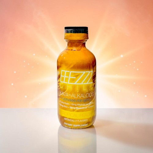 A bottle of fizzy drink with a bright orange background.