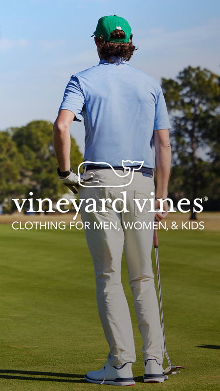 Person in golf attire standing on a green with brand logo overlay.