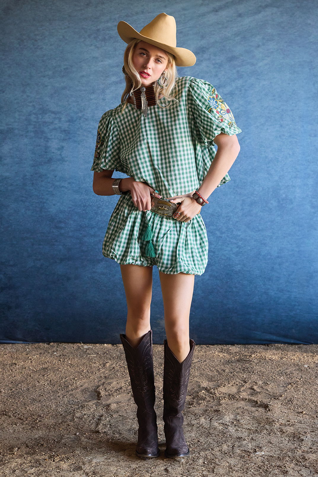 Hailey wearing the Tea Party Top and Tea Party Bauble Shorts with the Long Tall Sally Boots and Double D Ranch jewelry and accessories.