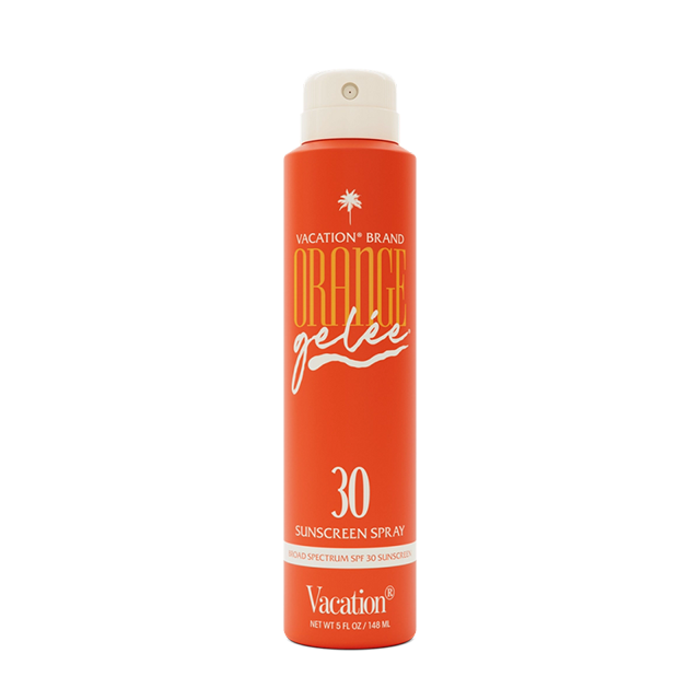 Sunscreen spray bottle with SPF 30, featuring a bright orange label.
