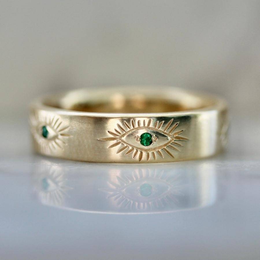 evil eye engraved emerald wedding ring