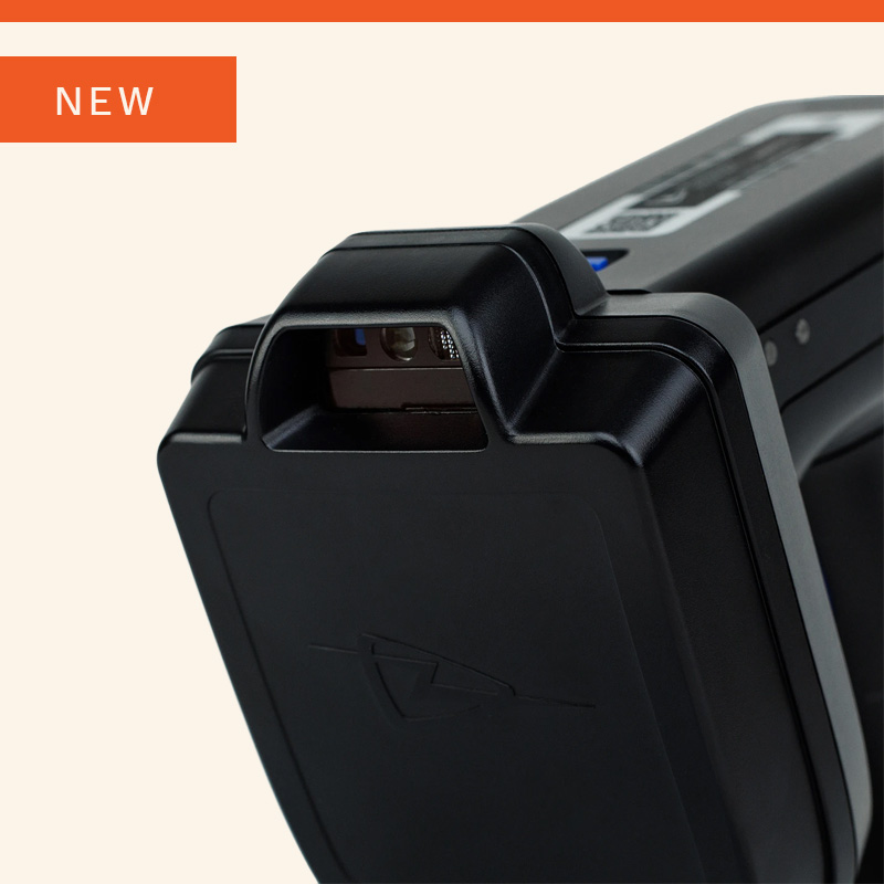 Close-up of a new device with a black casing and connector.