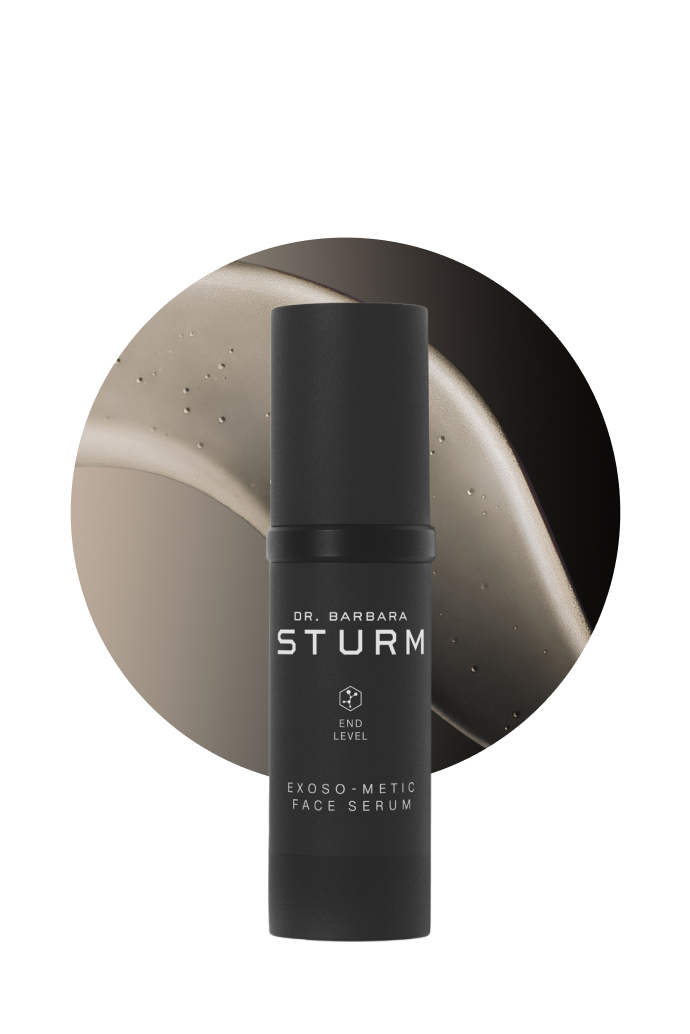 Black bottle of Dr. Barbara Sturm Exoso-Met Face Serum on a circular background.