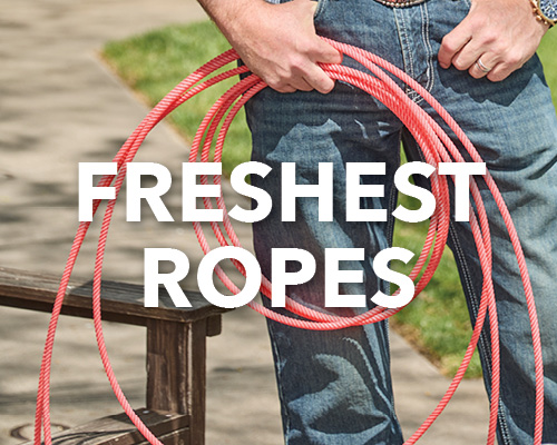 Person holding red ropes with the text 