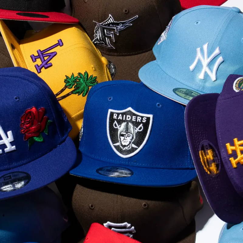 several new era hat styles scattered