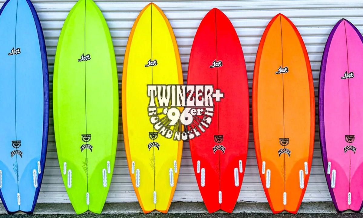 6 surfboards lined up next to each other
