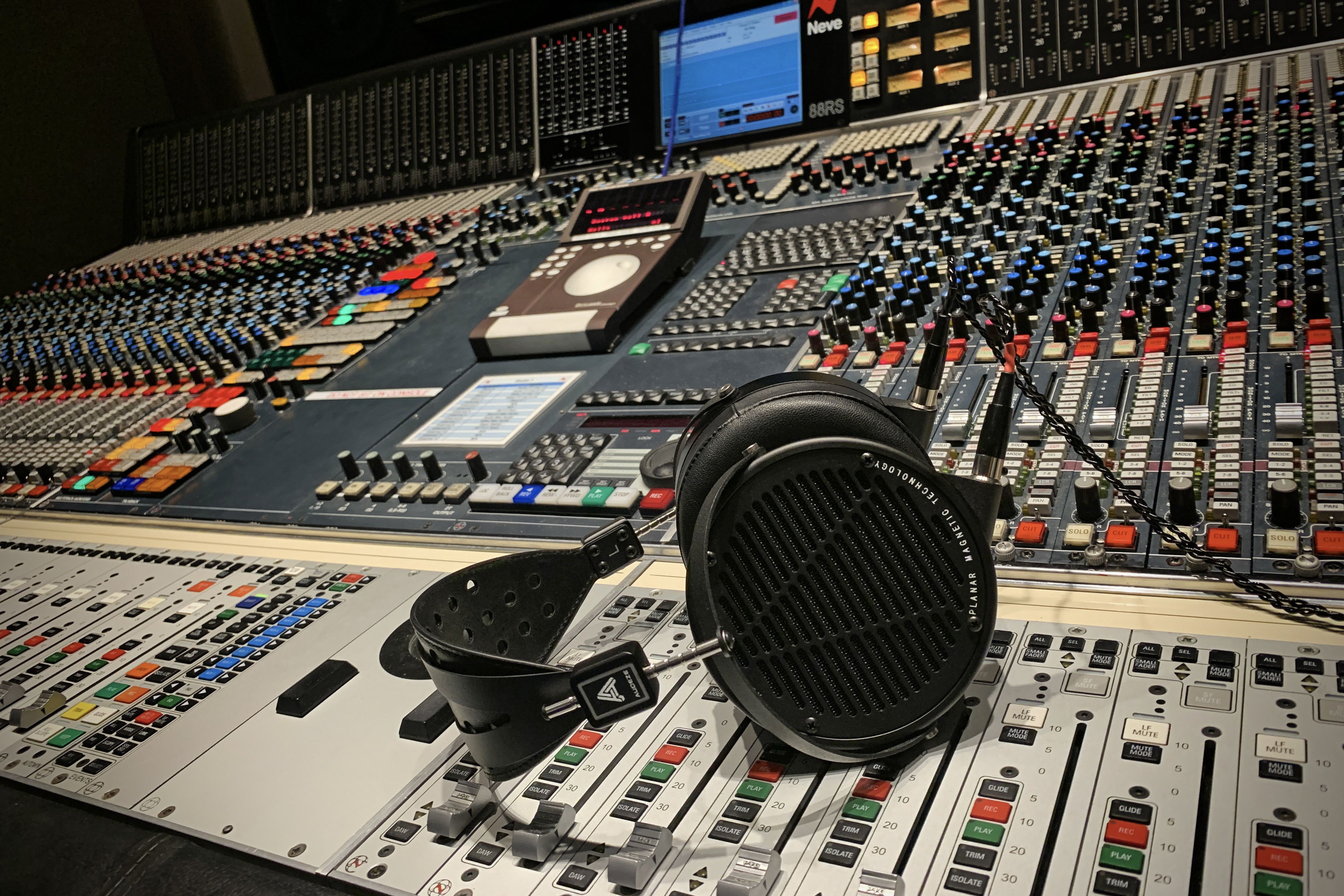 Audeze LCD-X headphones laying on the mixing console