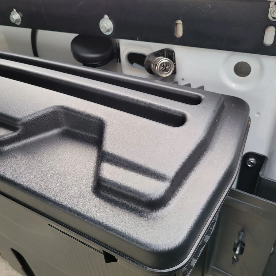 Spare tire delete tray and kit hardware staged on Steven's GMC Sierra NNBS photo 2