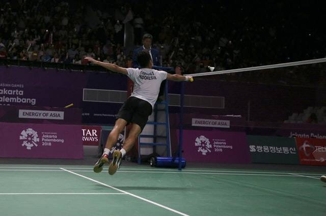 Person Playing Badminton