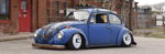 Low blue 1971 Volkswagen Super Beetle patina hood white wheels roof rack with horns Zach's Shocker XL featured customer install gallery photo 1