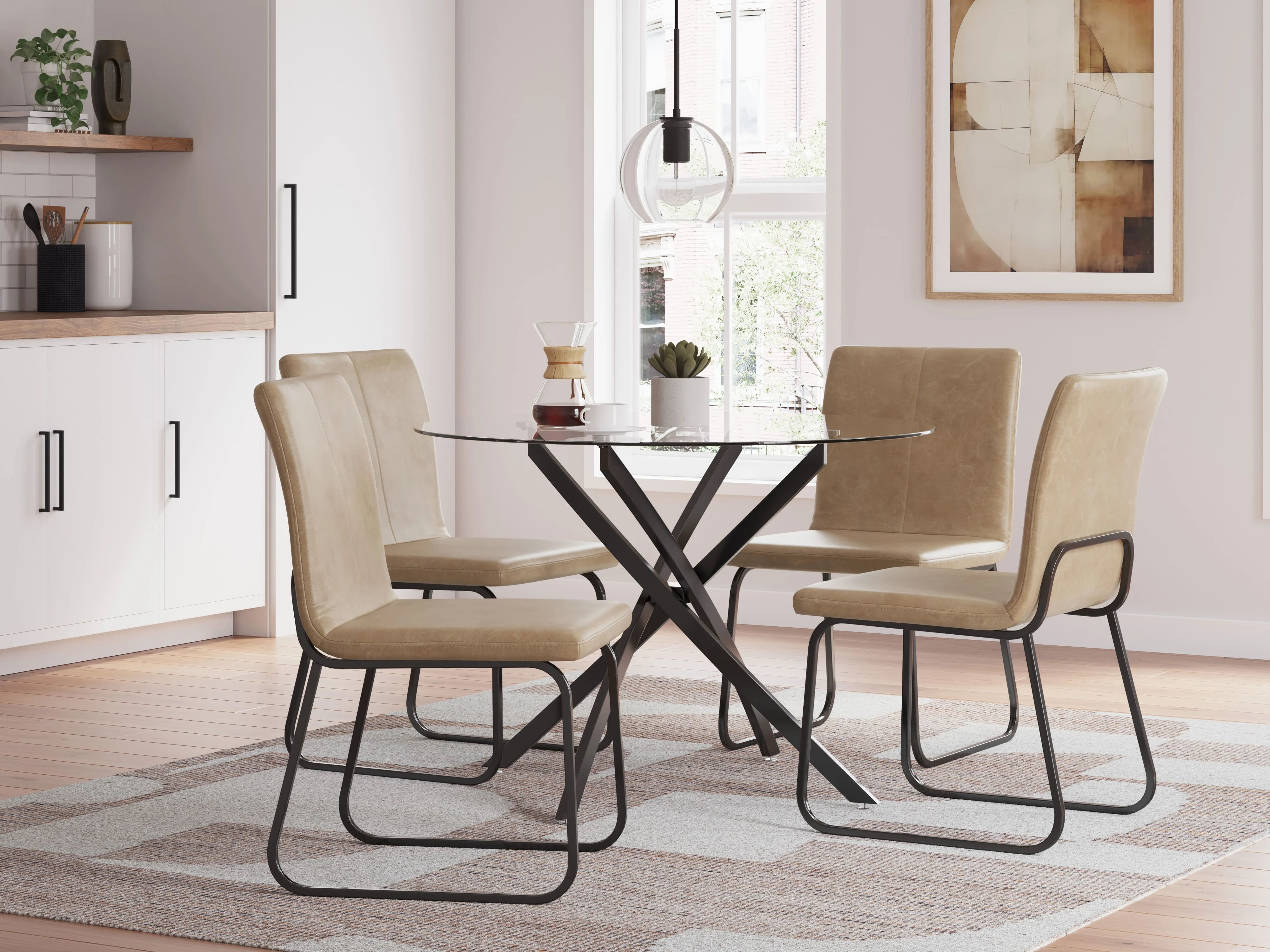 Modern dining table with four chairs in a bright room.