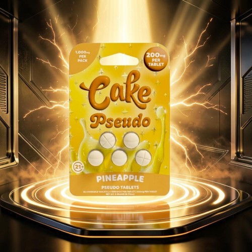 Pineapple-flavored cake mix package with a vibrant yellow design.